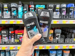 2 Axe Deodorant Sticks held up in deodorant aisle in Walmart stores