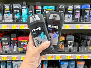 2 Axe Deodorant Sticks held up in deodorant aisle in Walmart stores
