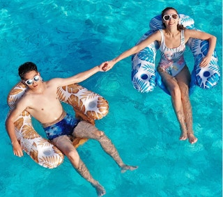 pool float chairs in a pool