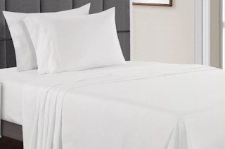 white cooling sheets on a bed