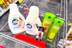 all detergent, garnier shampoo, and covergirl makeup in a cart