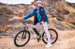 Lifestyle image of adult on electric bike outdoors