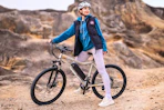 Lifestyle image of adult on electric bike outdoors