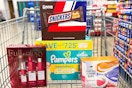 pampers diapers, snickers candy bars, dove soap, and nexxus hair care in a cart