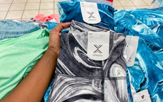 hand holding women's activewear