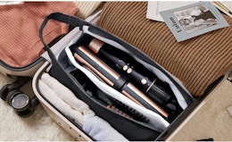 air styler attachments in a bag in a suitcase