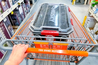 In-Store photo of a Husky 20-gallon Professional Storage Container inside a Home Depot shopping cart