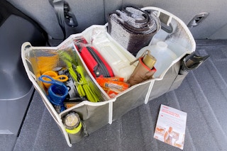 aarp free trunk organizer new member gift with supplies and information card in trunk