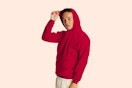 a man wearing a hanes hoodie