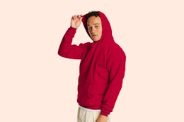 a man wearing a hanes hoodie