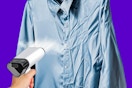 Close up shot of the Loheer clothes steamer used to de-wrinkle a button-up shirt 