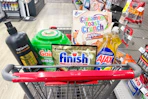 tresemme shampoo, gain flings, finish dishwasher tabs, ajax dish soap, and cinnamon toast crunch cereal in a cart
