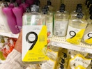 hand holding 9 elements dish soap at target