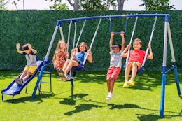 Lifestyle image of kids swinging on the Sportspower Swing Set outside