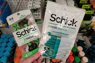 hand holding schick razors