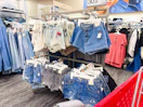 women's jean shorts sitting on target shelves