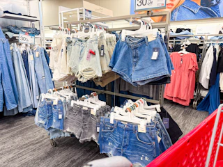 women's jean shorts sitting on target shelves
