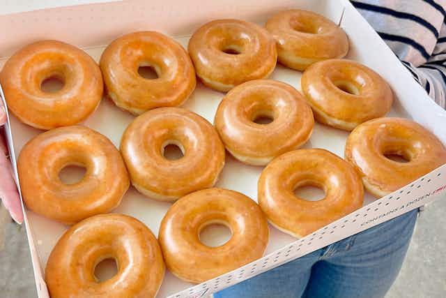 Krispy Kreme Deals: $2 Dozen With Purchase of A Dozen ($0.72 per doughnut) card image