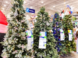 Pre-Lit and Flocked 6.5-Foot Christmas Tree, $40 at Home Depot (Reg. $80) card image