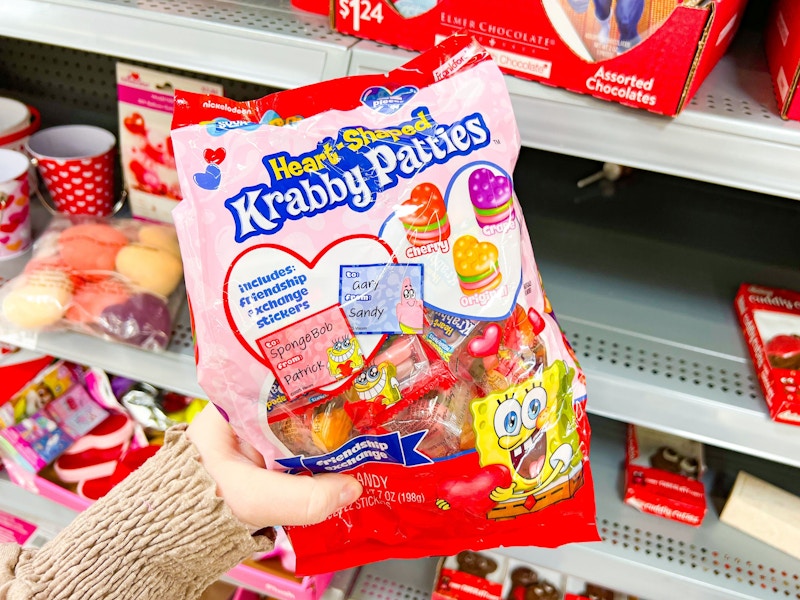 hand holding krabby patties gummies at walmart