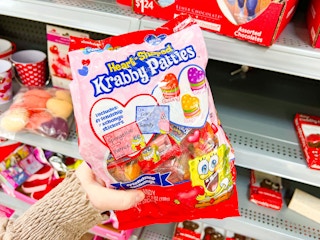 hand holding krabby patties gummies at walmart