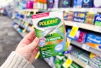 person holding polident retainer cleaner tablets