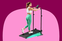 Woman using a walking pad at an incline