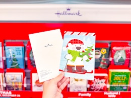 hand holding hallmark card at cvs
