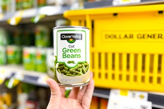 hand holding a can of clover valley vegetables