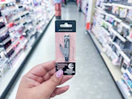 hand holding a japonesque nail clipper in walgreens