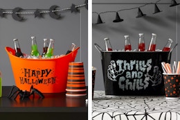 2 halloween beverage tubs sitting side by side