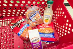 doritos, ball park buns, goldfish crackers, tyson chicken nuggets, and simply lemonade in a cart