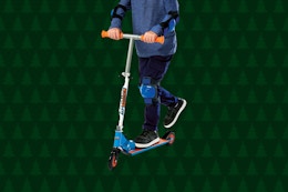 child riding on a kick scooter