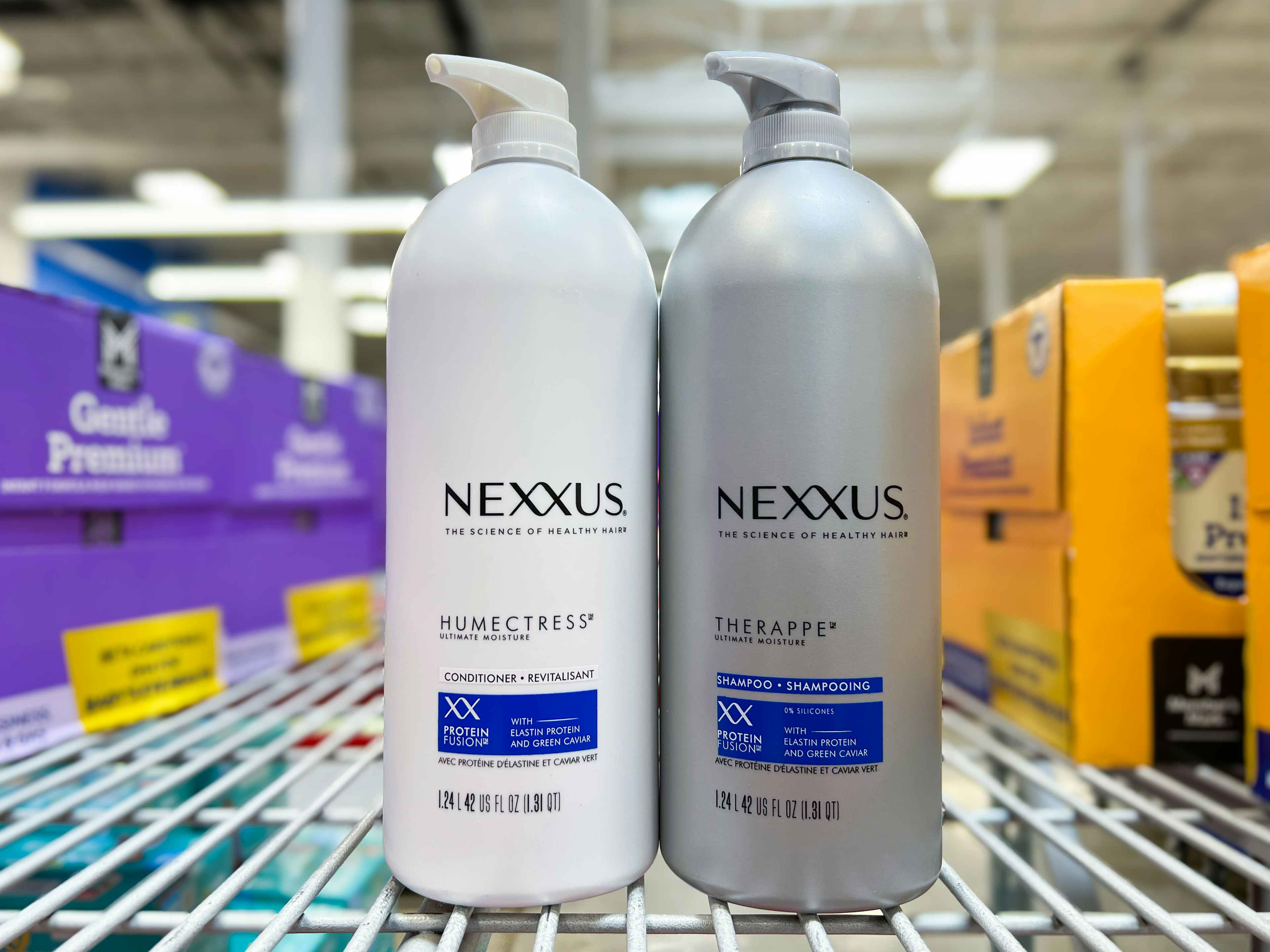 nexxus shampoo and conditioner on a shelf