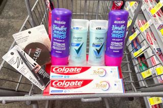 covergirl, aussie, degree, and colgate products in a cart