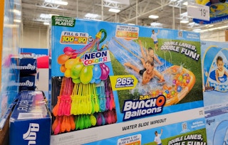 a double lane waterslide with 265 balloons