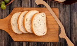 a sourdough bread knife on a cutting board