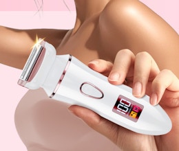 a person holding a bikini trimmer