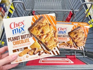 two boxes of Chex Mix bars in shopping cart