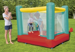 kids bounce house with a mom on the outside clapping her hands
