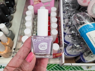 hand holding nail polish