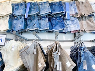 jeans on hangers in store
