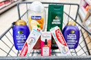 ogx shampoo, softsoap and irish spring body wash, truskin serum, and colgate toothpastes in a cart