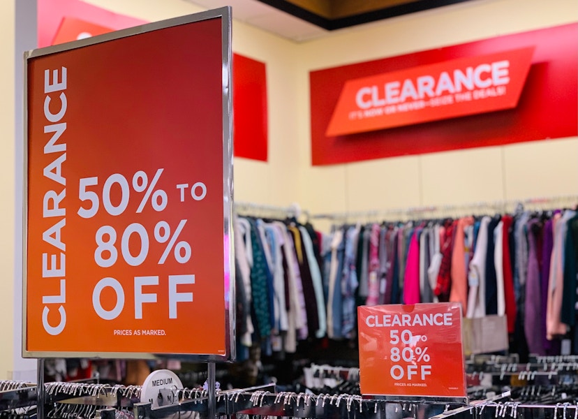 Kohls in store clearance racks with 50% to 80% off signs