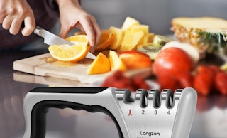a knife sharpener next to a cutting board with food 