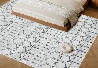 a gray and white area rug