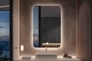 Lifestyle image of the LuxHomez LED backlit mirror used as a bathroom vanity mirror