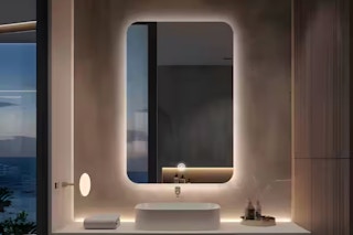 Lifestyle image of the LuxHomez LED backlit mirror used as a bathroom vanity mirror