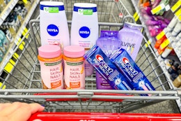 nivea body wash, loreal elvive shampoo, natures bounty gummies, and crest toothpaste in a cart