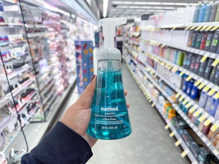 hand holding method hand soap in walgreens